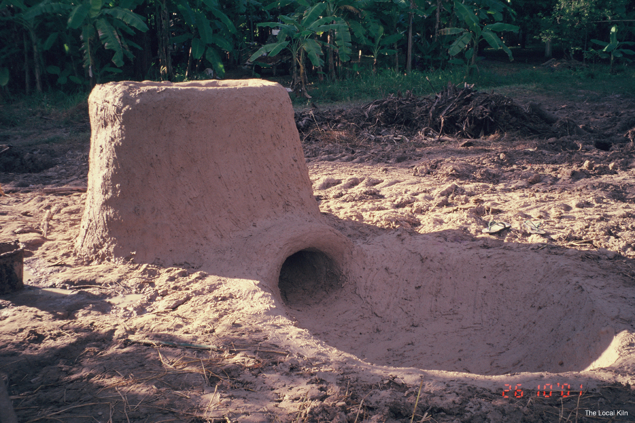 kiln built into dirt ground