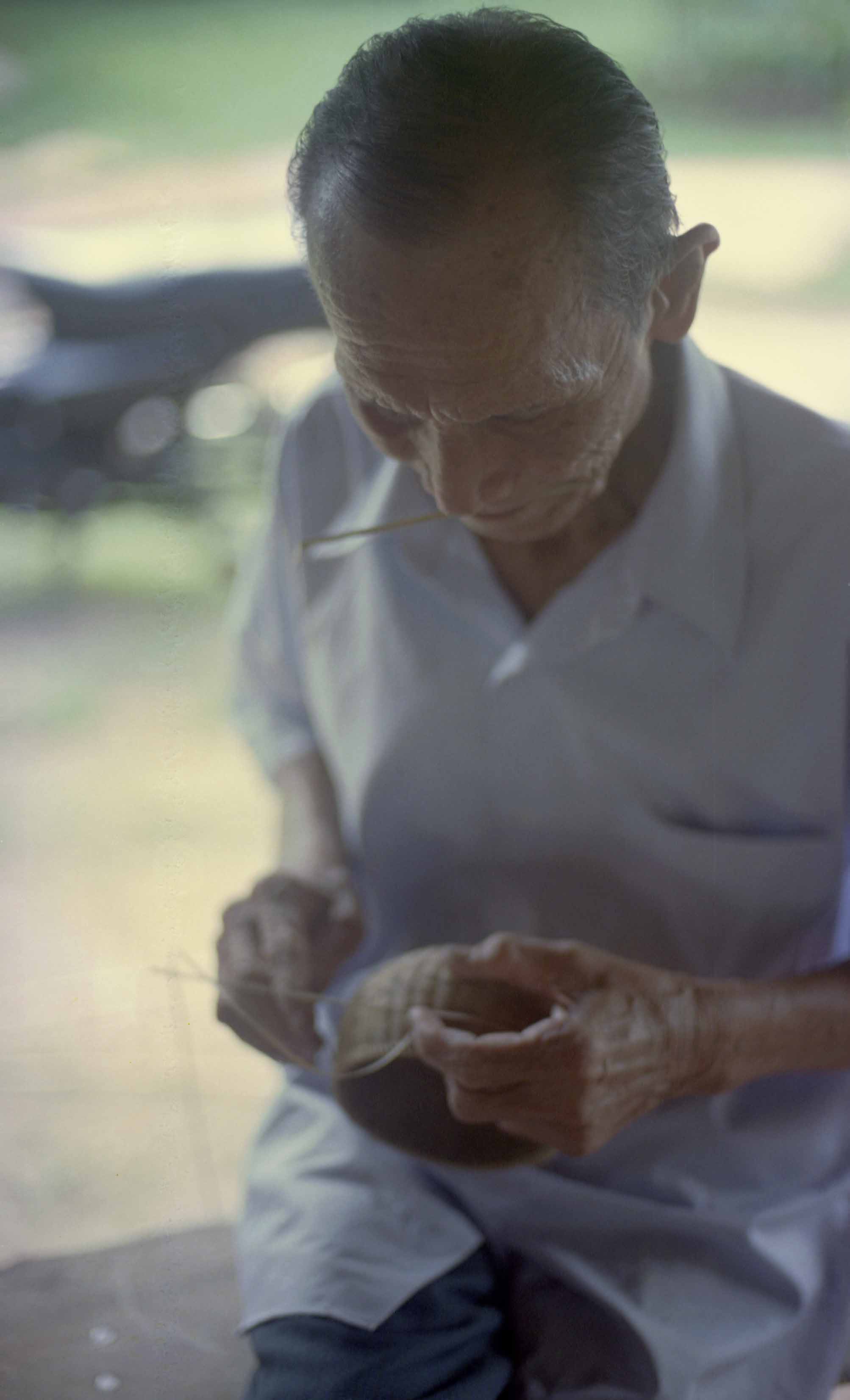 man weaving at Womanifesto Workshop 2001